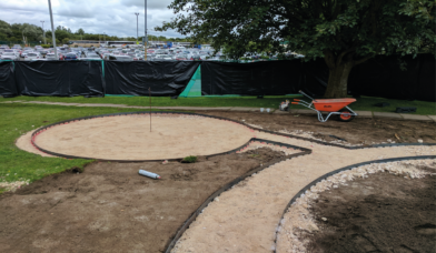 Commercial artificial grass metal edging preparation for the artificial grass installation